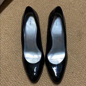 Used black heels. Great everyday shoe